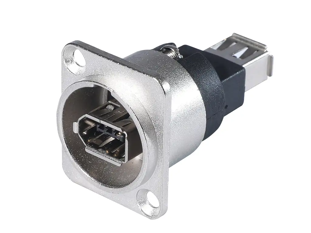 Newtide IE2210 IEEE 1394 adaptor, mounted in standardized nickel D-shape metal chassis housing.