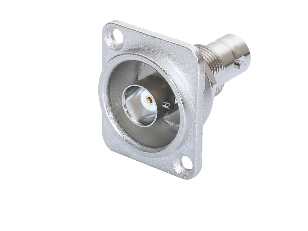 Newtide BNC2231 grounded BNC chassis connector, feedthrough in nickel D-shape metal housing, true 75 Ω design for HD signals.